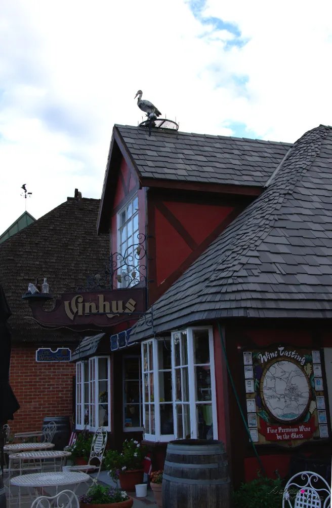 Red Danish-style Vinhus building with a stork on its roof in Solvang
